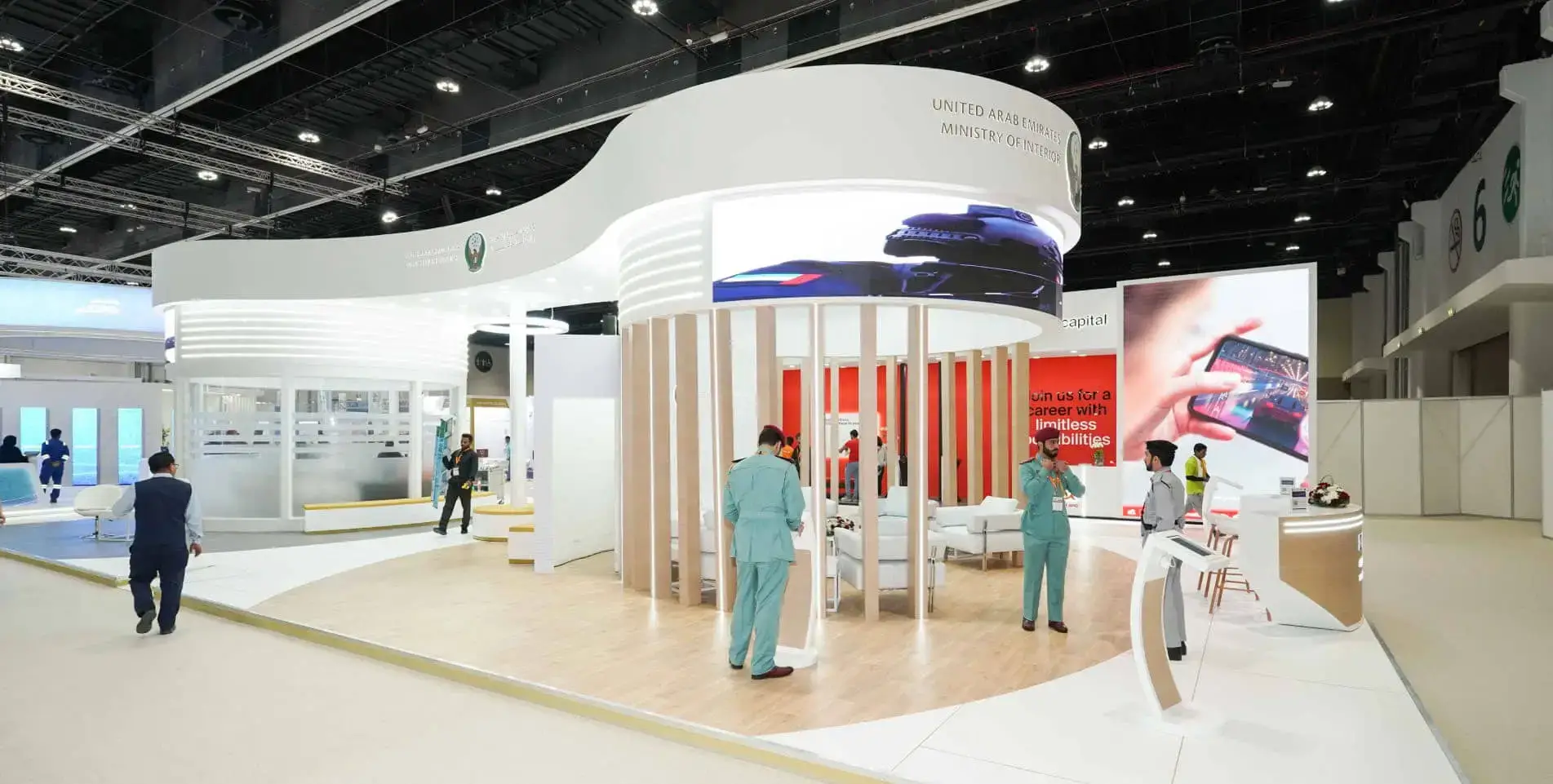 Healthcare exhibition stand with curved white structure built by INDEX Design in Dubai